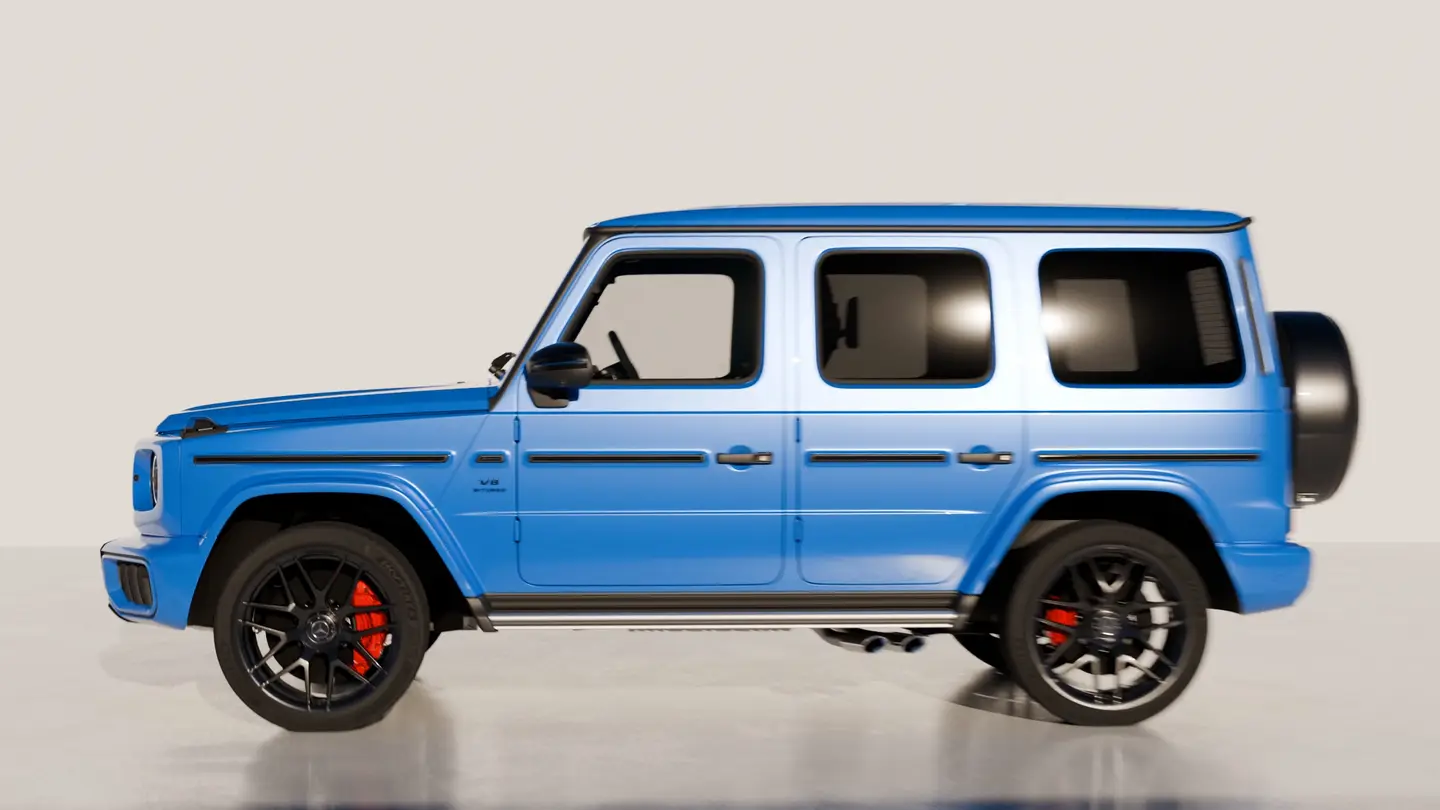 Side profile of a blue Mercedes-AMG G 63 in a bright studio.