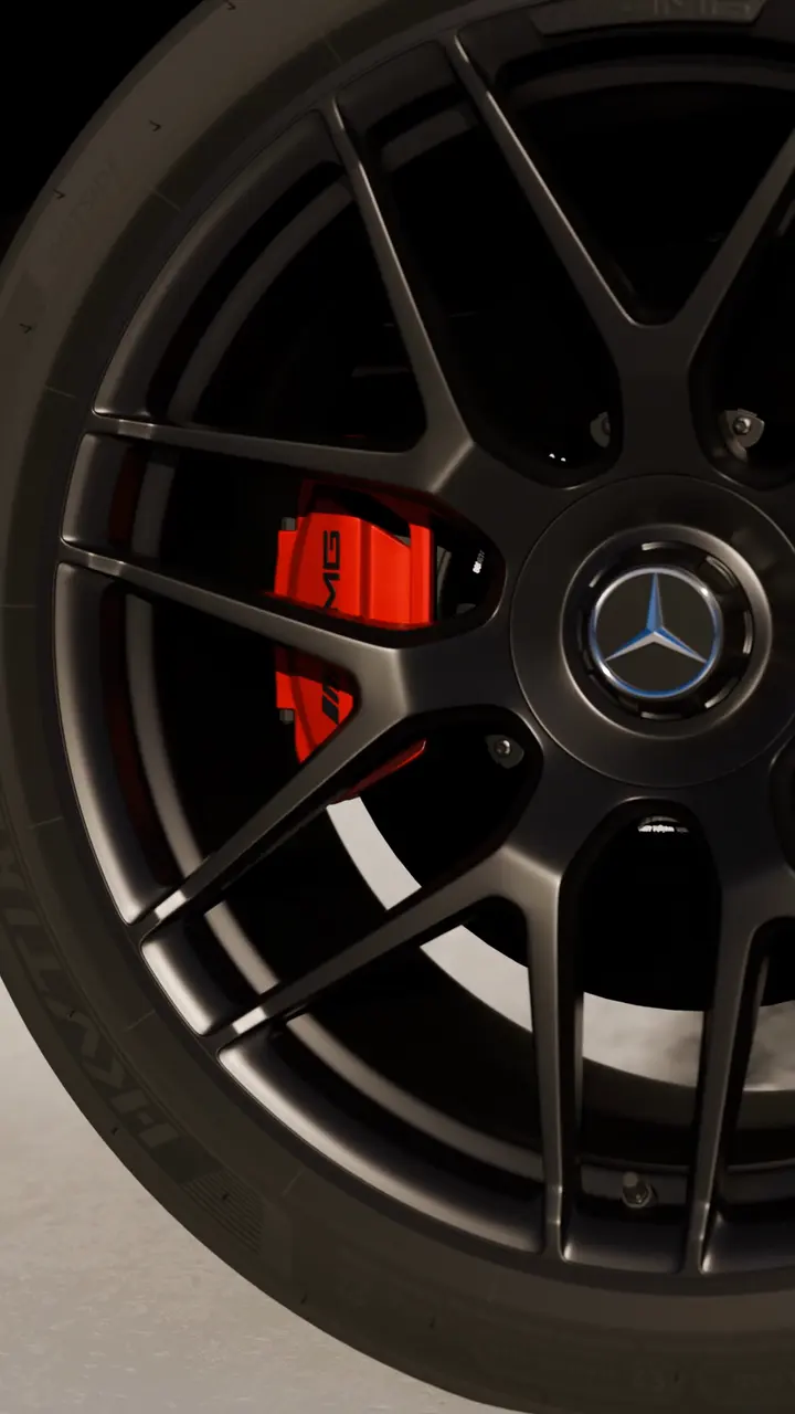 Close-up of a Mercedes-AMG G 63 alloy wheel, tyre and red brake calliper.